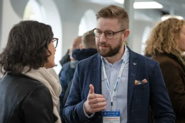 A man having a conversation with a woma
